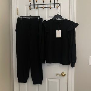 Super cute on trend two piece jogger set with eyelet details. NWT.